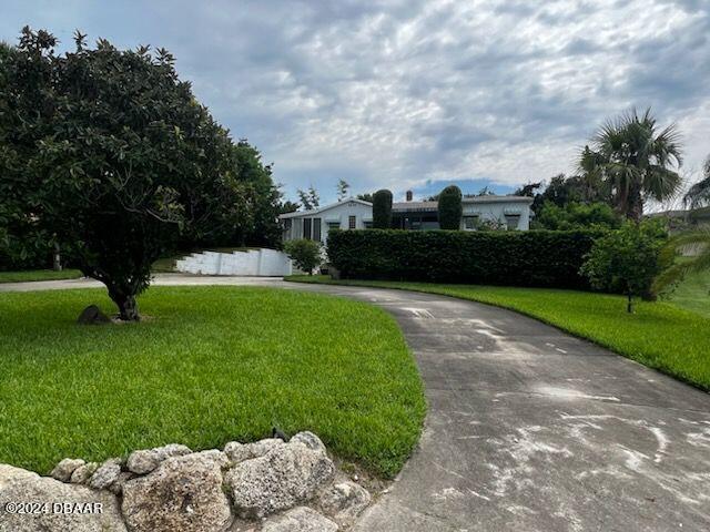 a view of a garden with a fountain