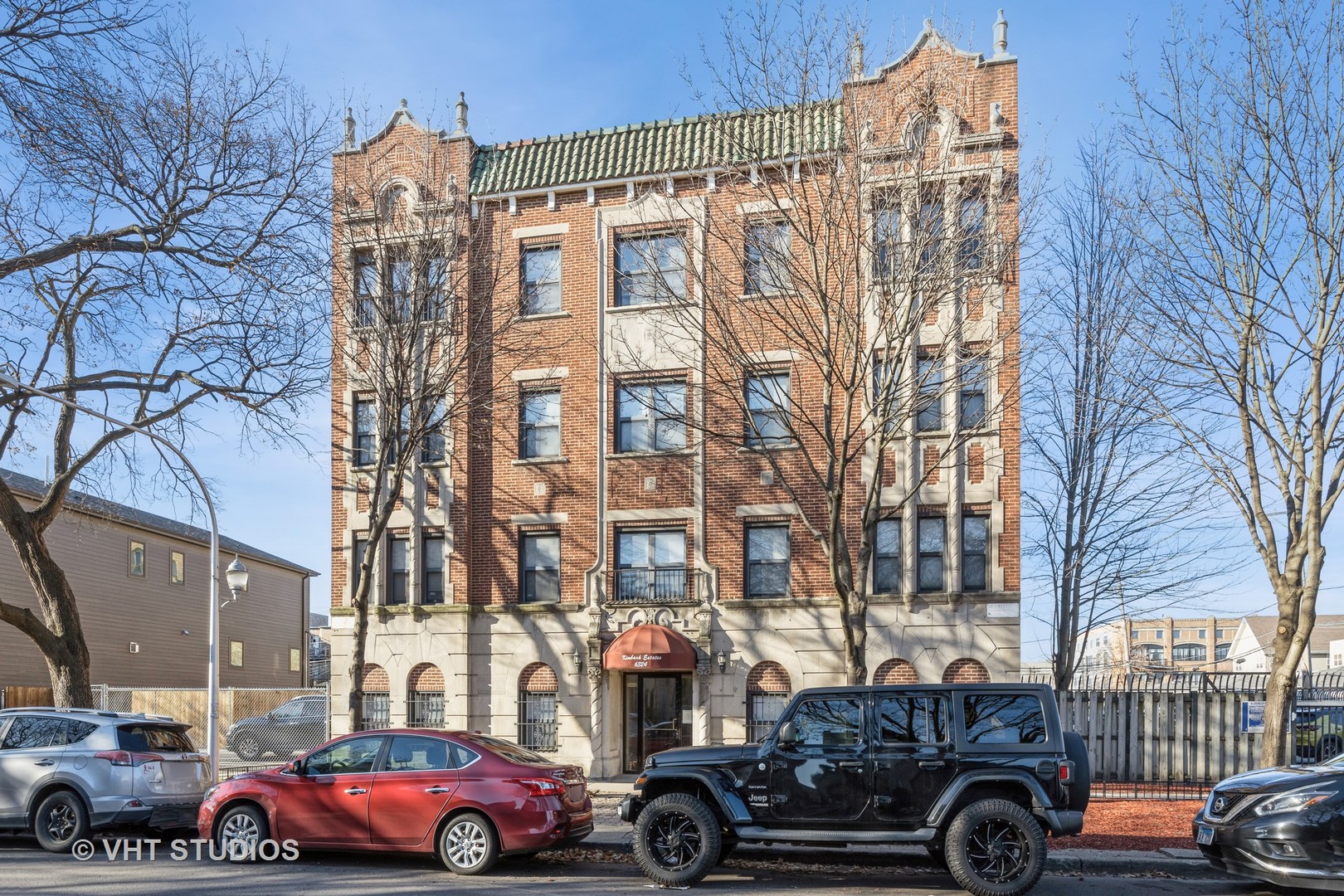 a cars parked in front of a building