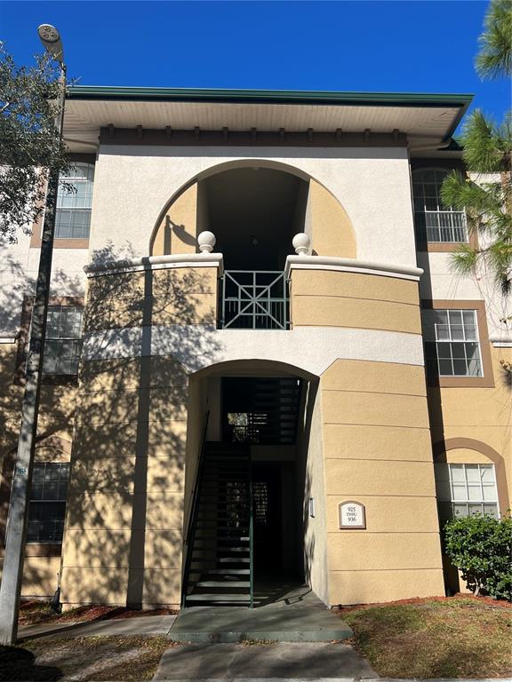 a front view of a house with garage