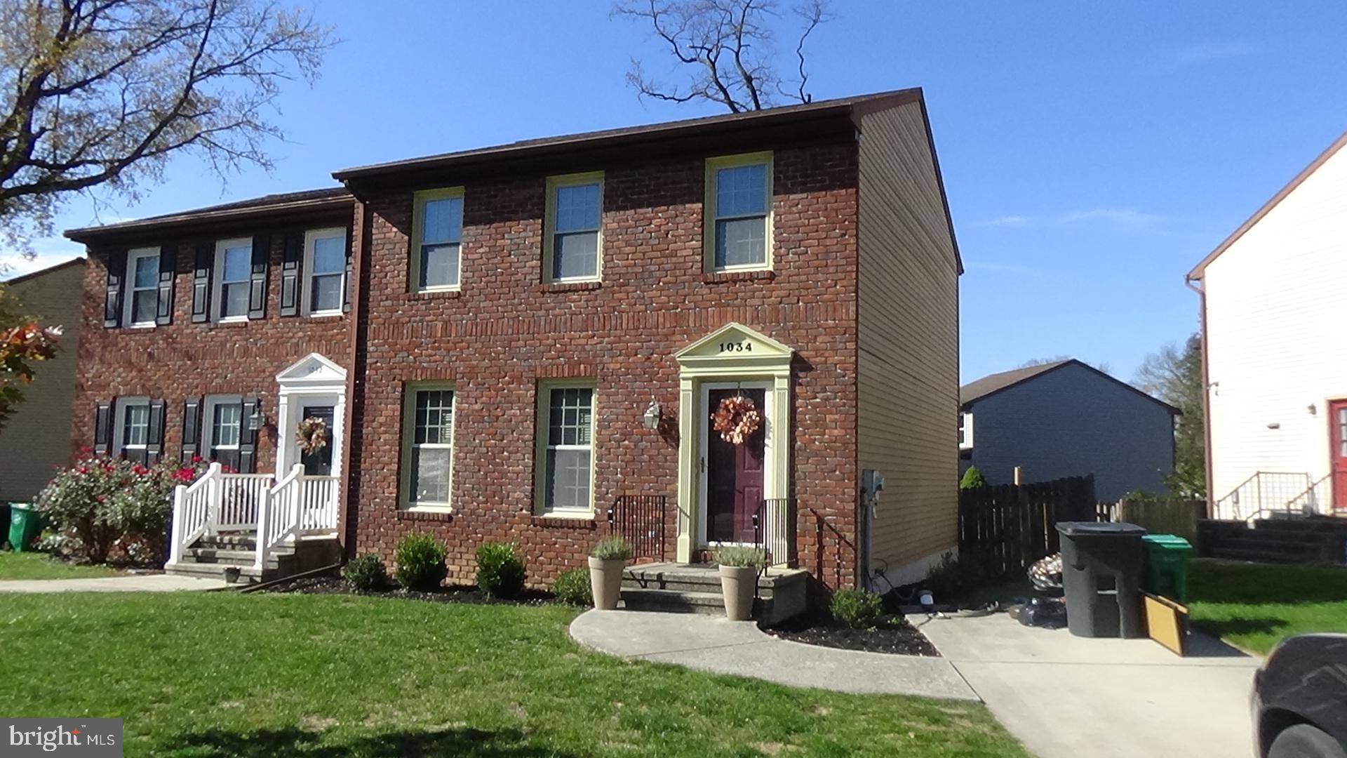 a front view of house with yard