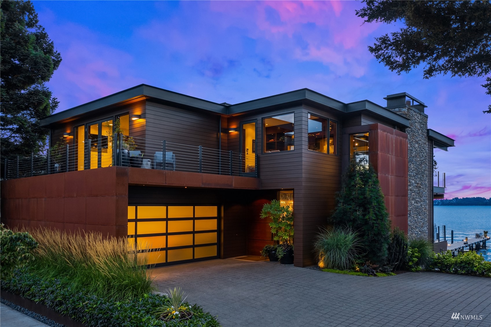 a front view of a house with a garage