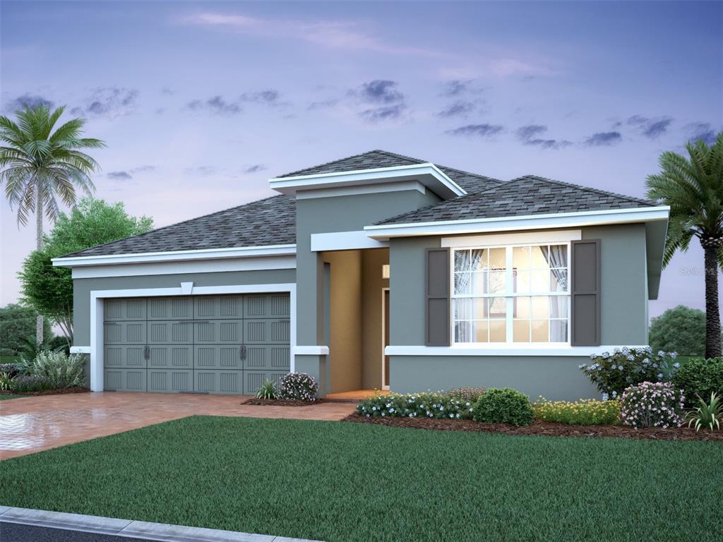 a front view of a house with a garden and garage