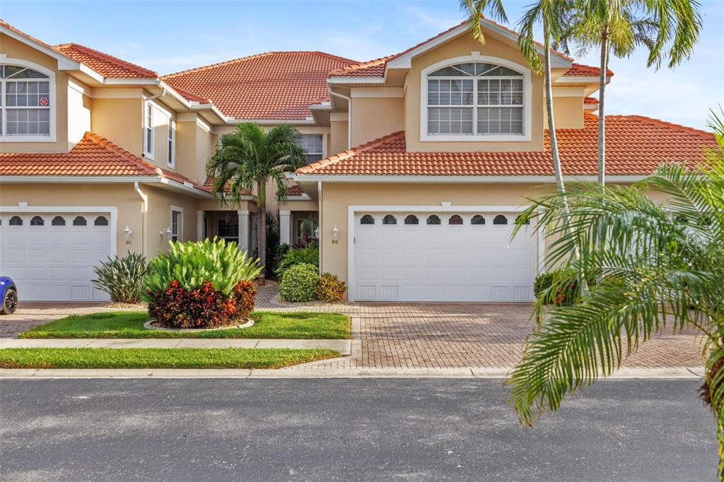 The tile roofs were all replaced in 2023 and compliment the Florida style architecture that is so popular here.  Each building has 4 units with a well designed community layout.