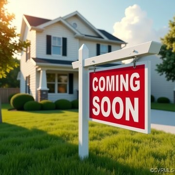 a sign that is sitting in front of a house