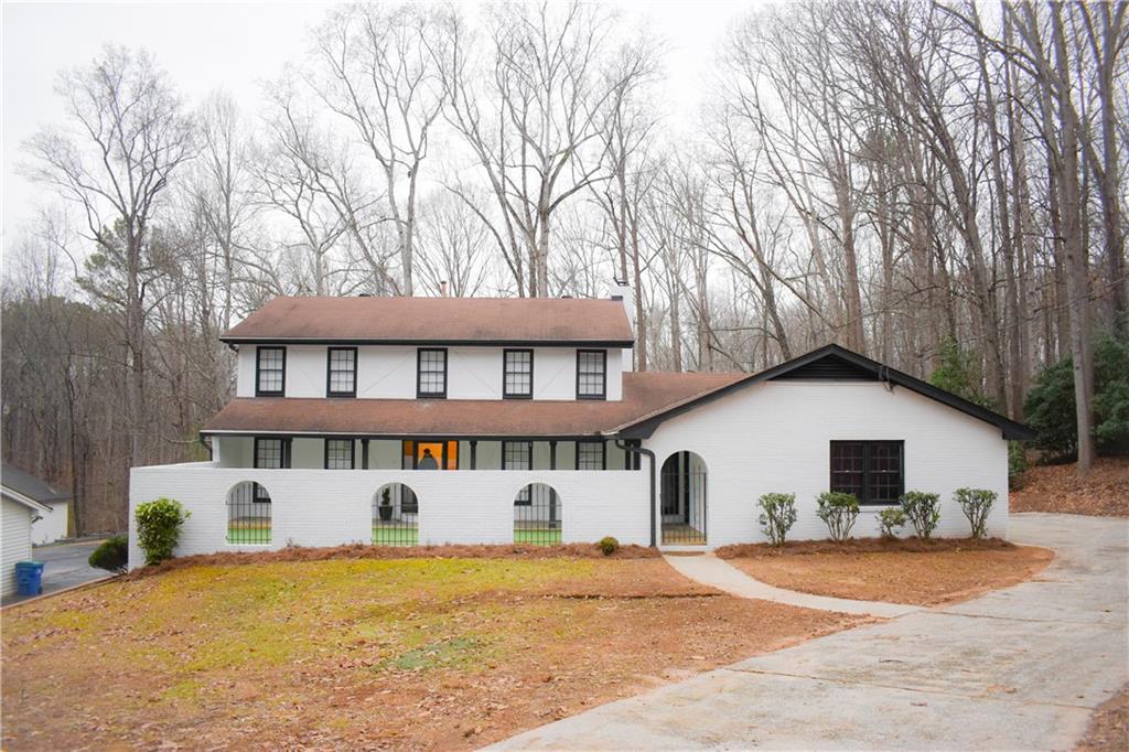 front view of a house with a yard