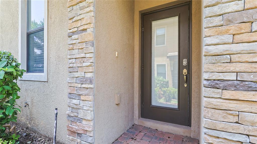 a view of a balcony with a door