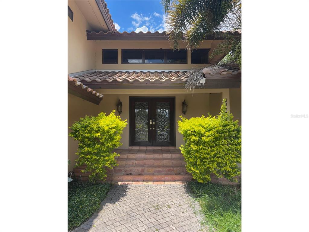 a view of a entryway door front of house