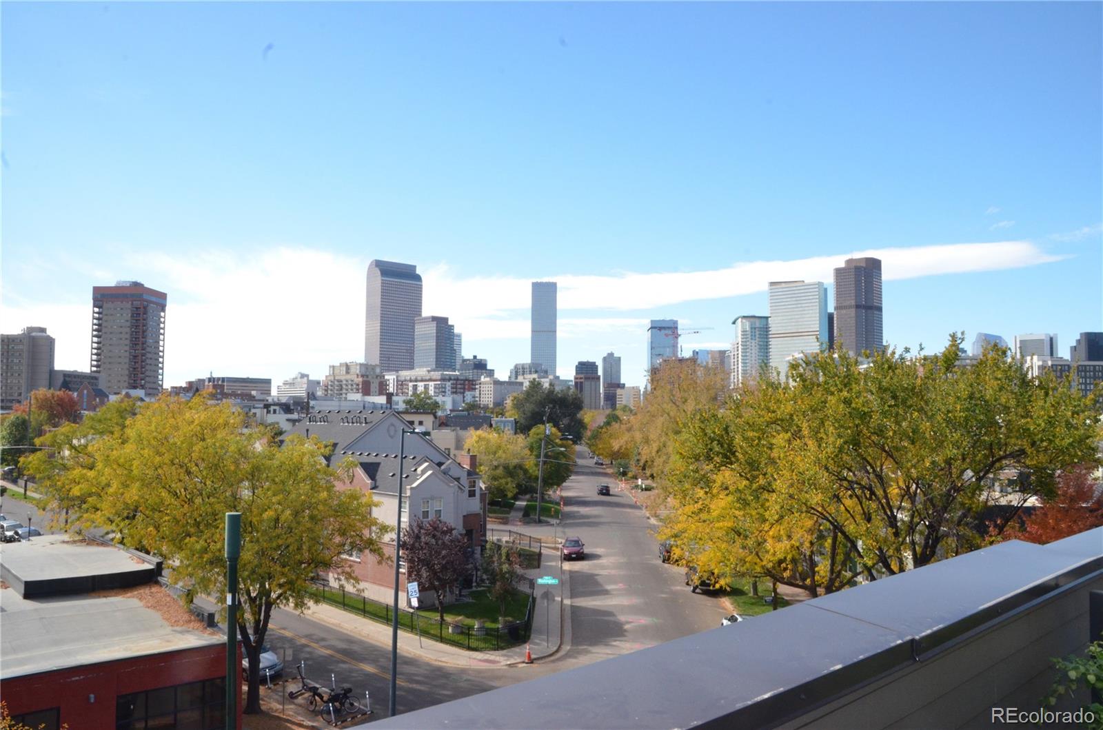 a view of a city with tall buildings