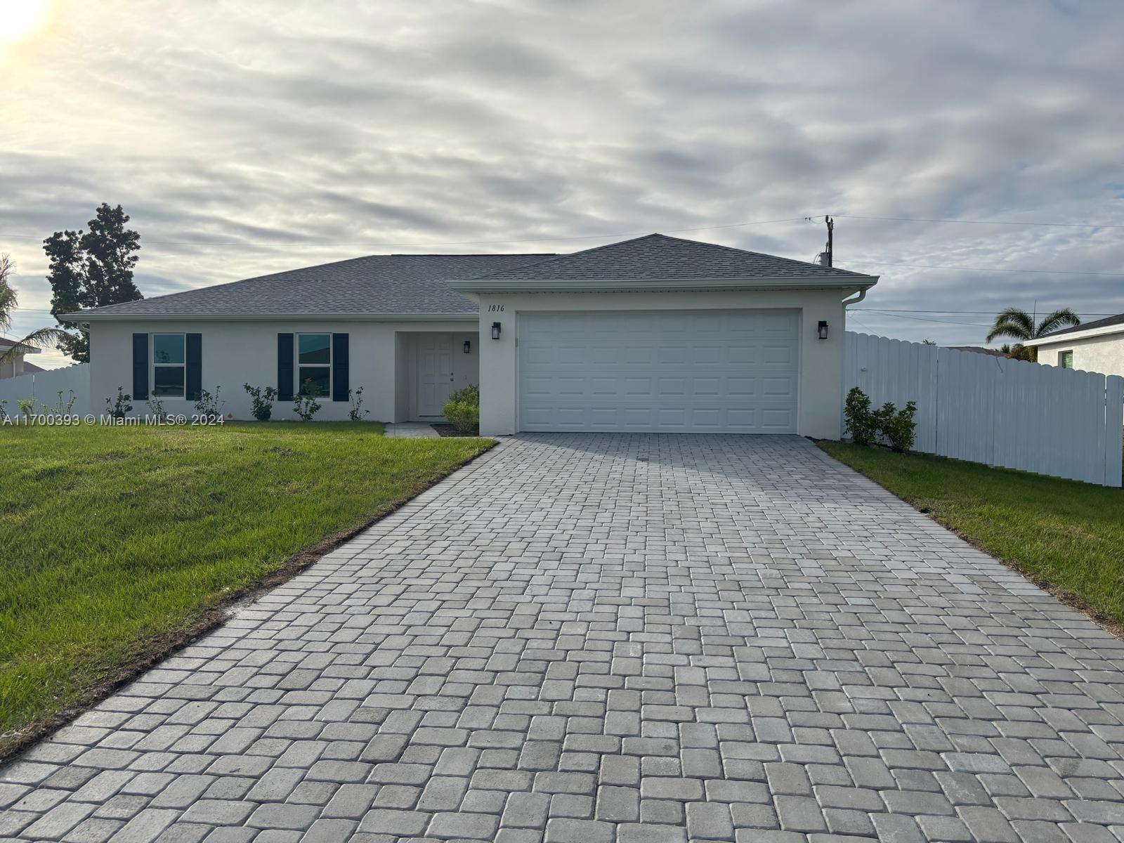 a front view of house with yard