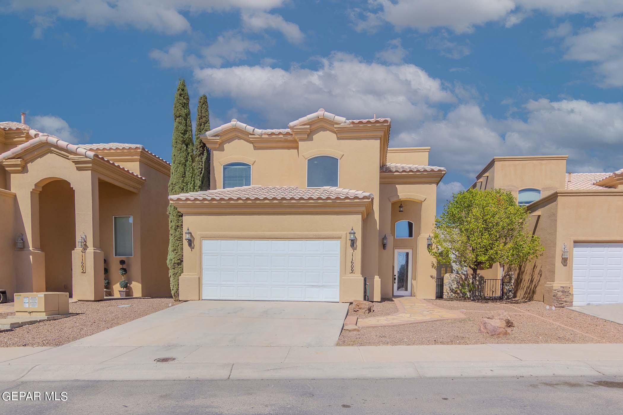 front view of a house with a garage