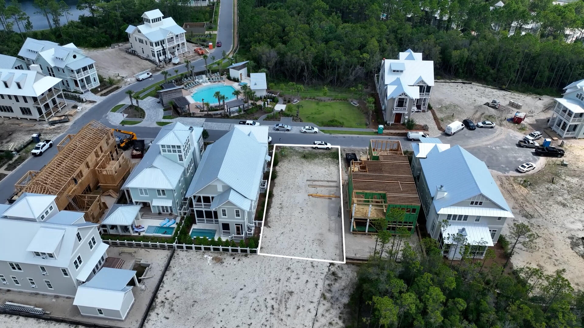 an aerial view of multiple houses with outdoor space