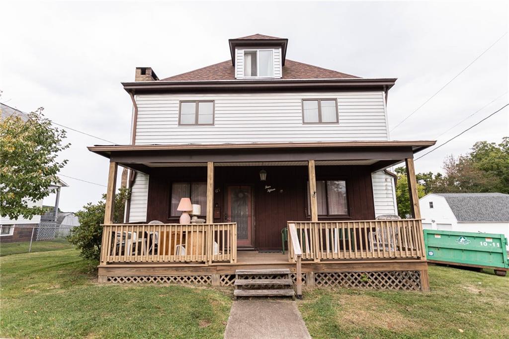 front view of a house with a deck