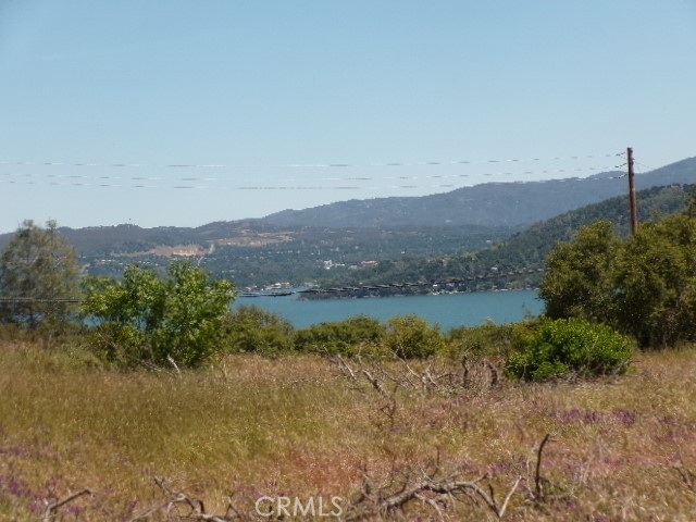 a view of a town with mountains in the background