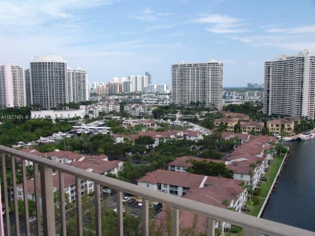 a view of a city with tall buildings