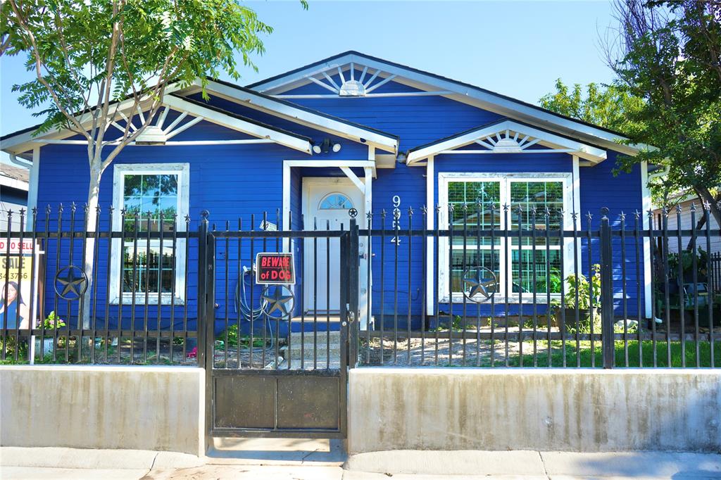 front view of a house with a small yard