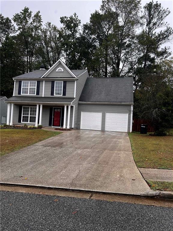 a front view of house with yard