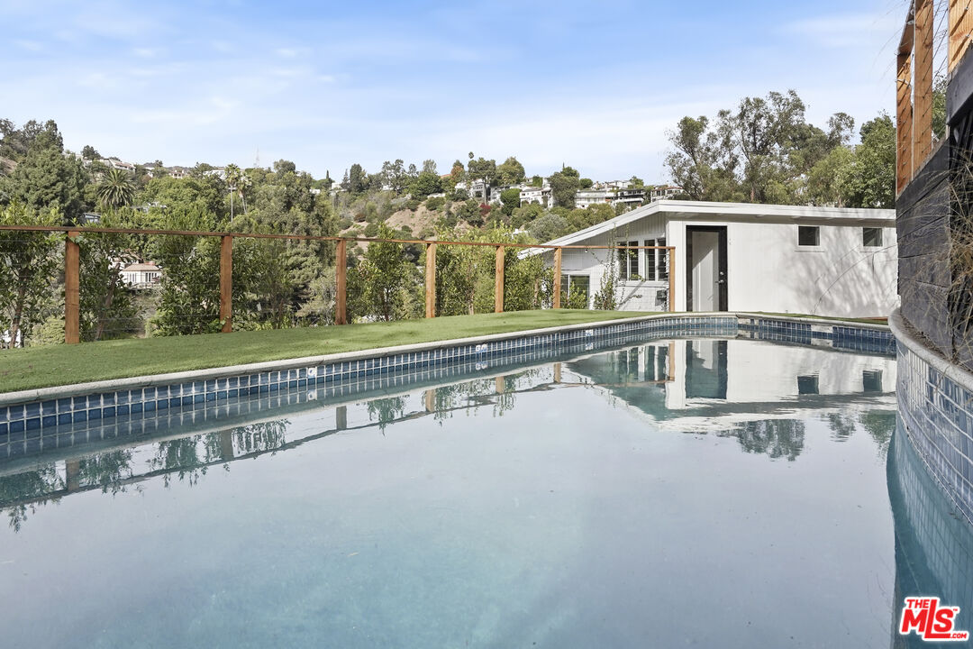 a view of a house with a roof deck