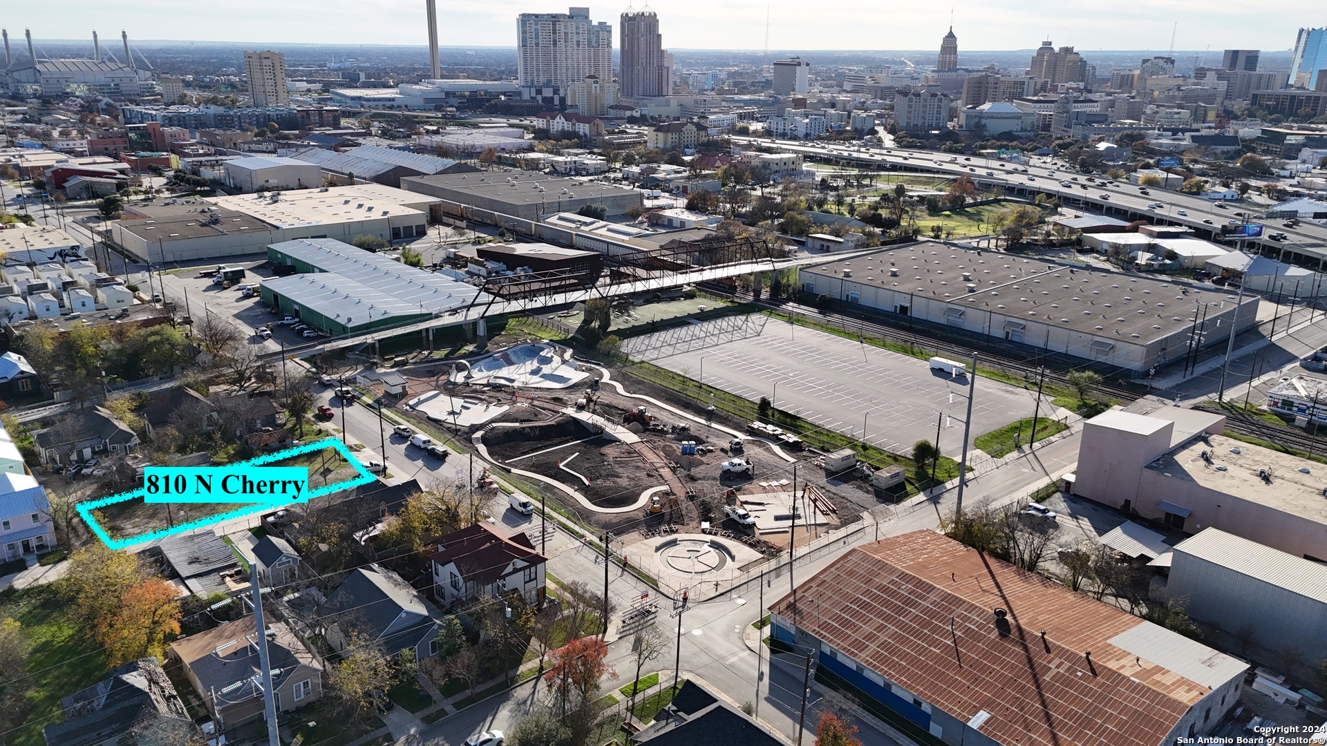 an aerial view of a city with lots of residential buildings