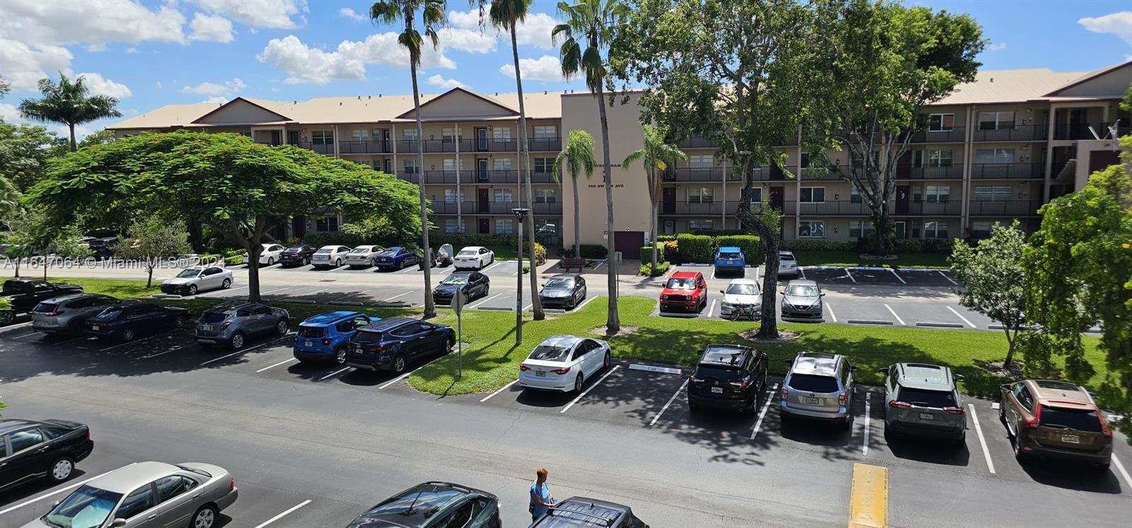 a group of cars parked in front of a house