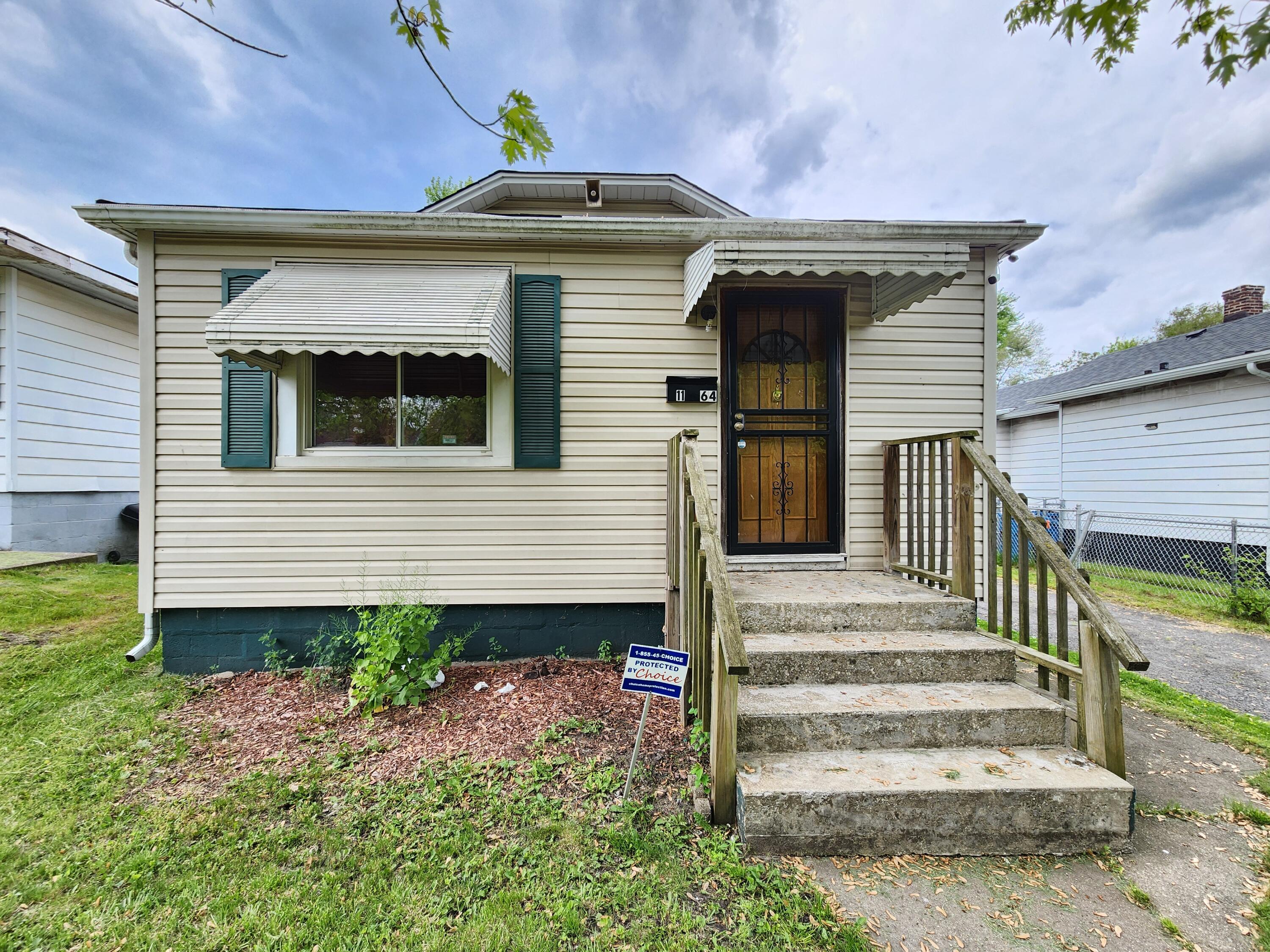 a front view of a house with a porch