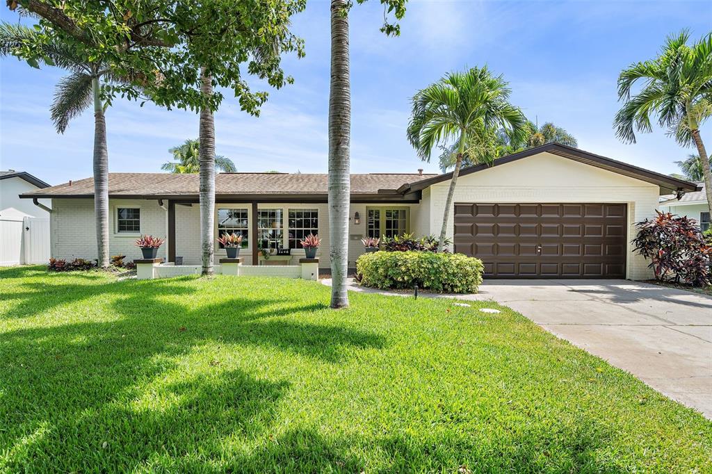 front view of a house with a yard