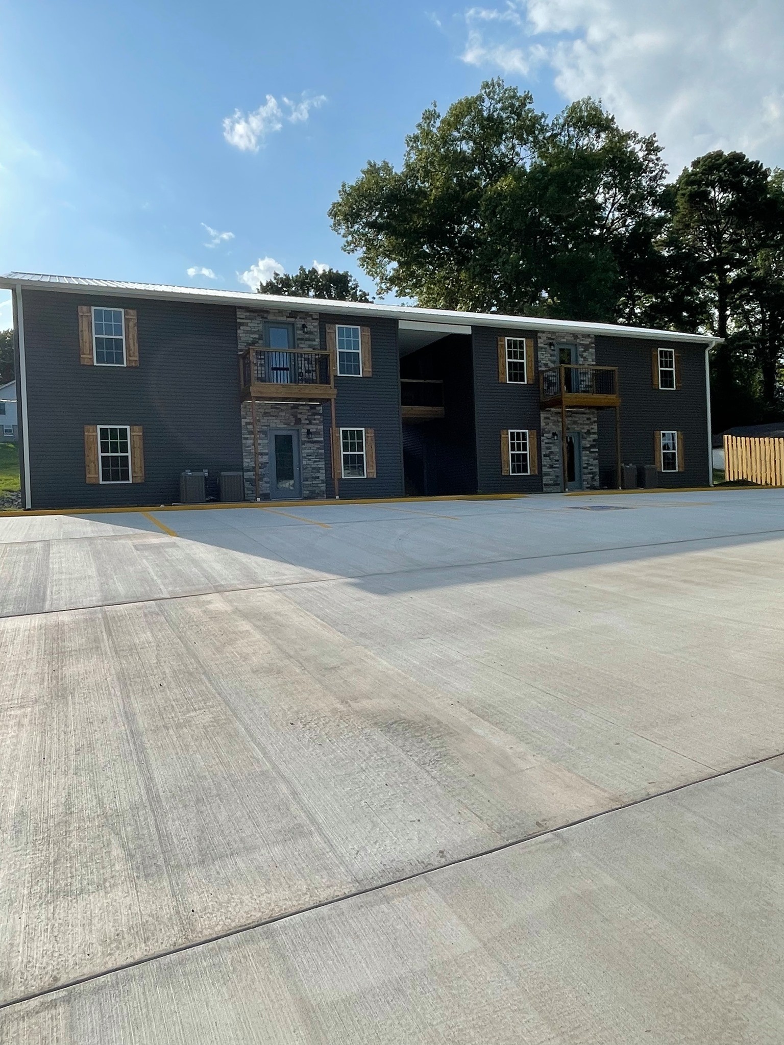 a front view of a house with a garage