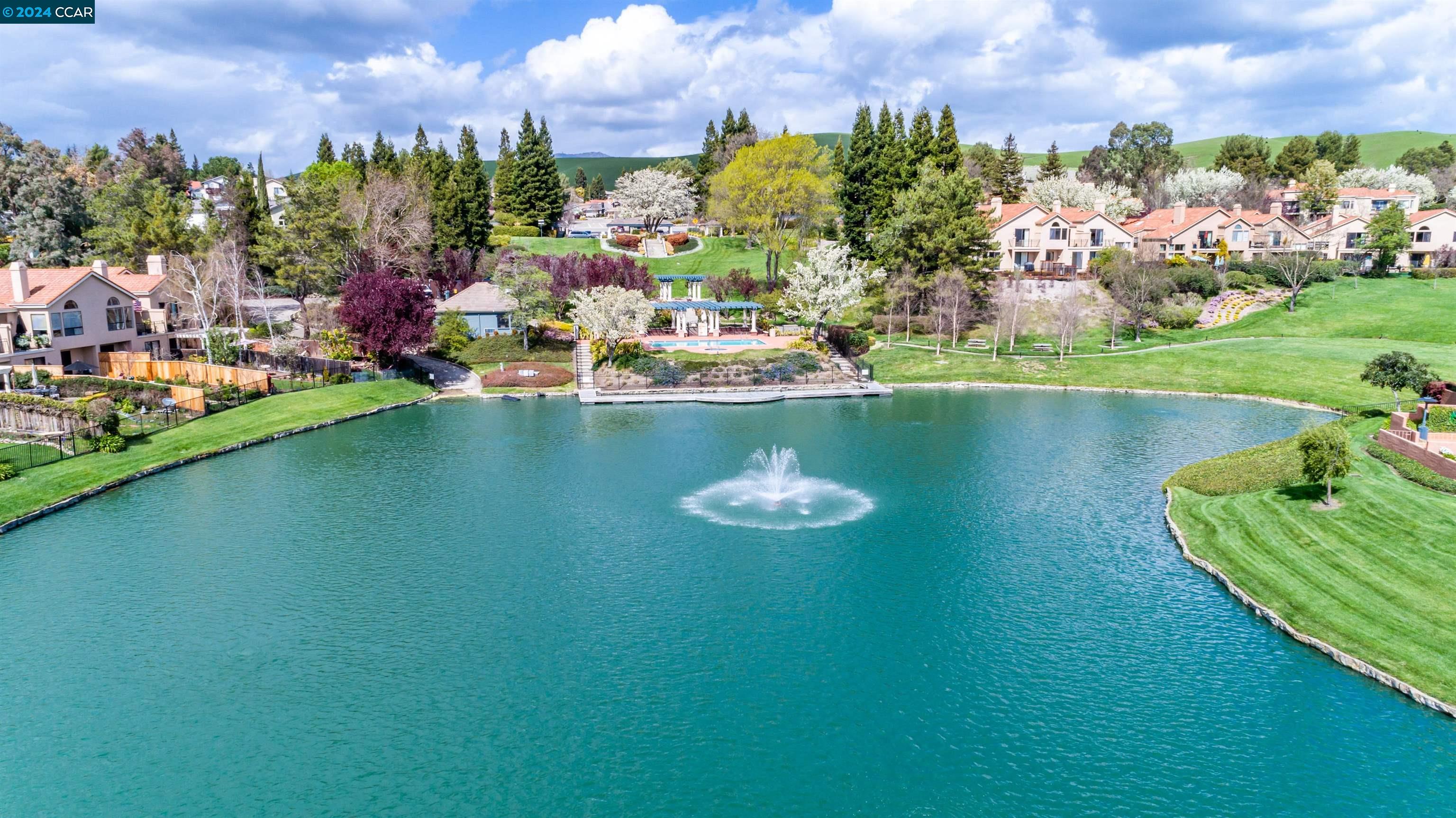 a view of a lake with a city