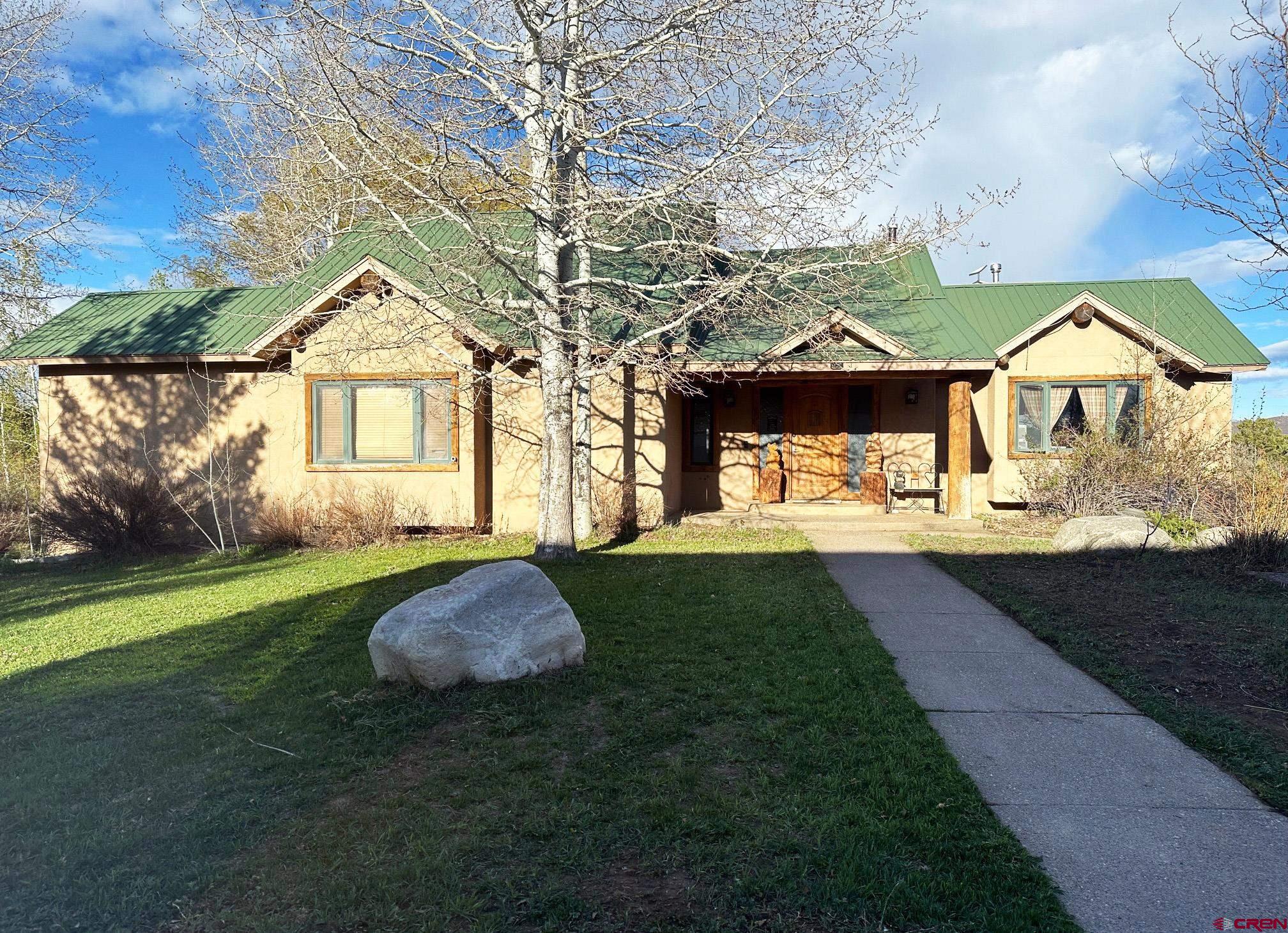 a view of outdoor space yard and garage