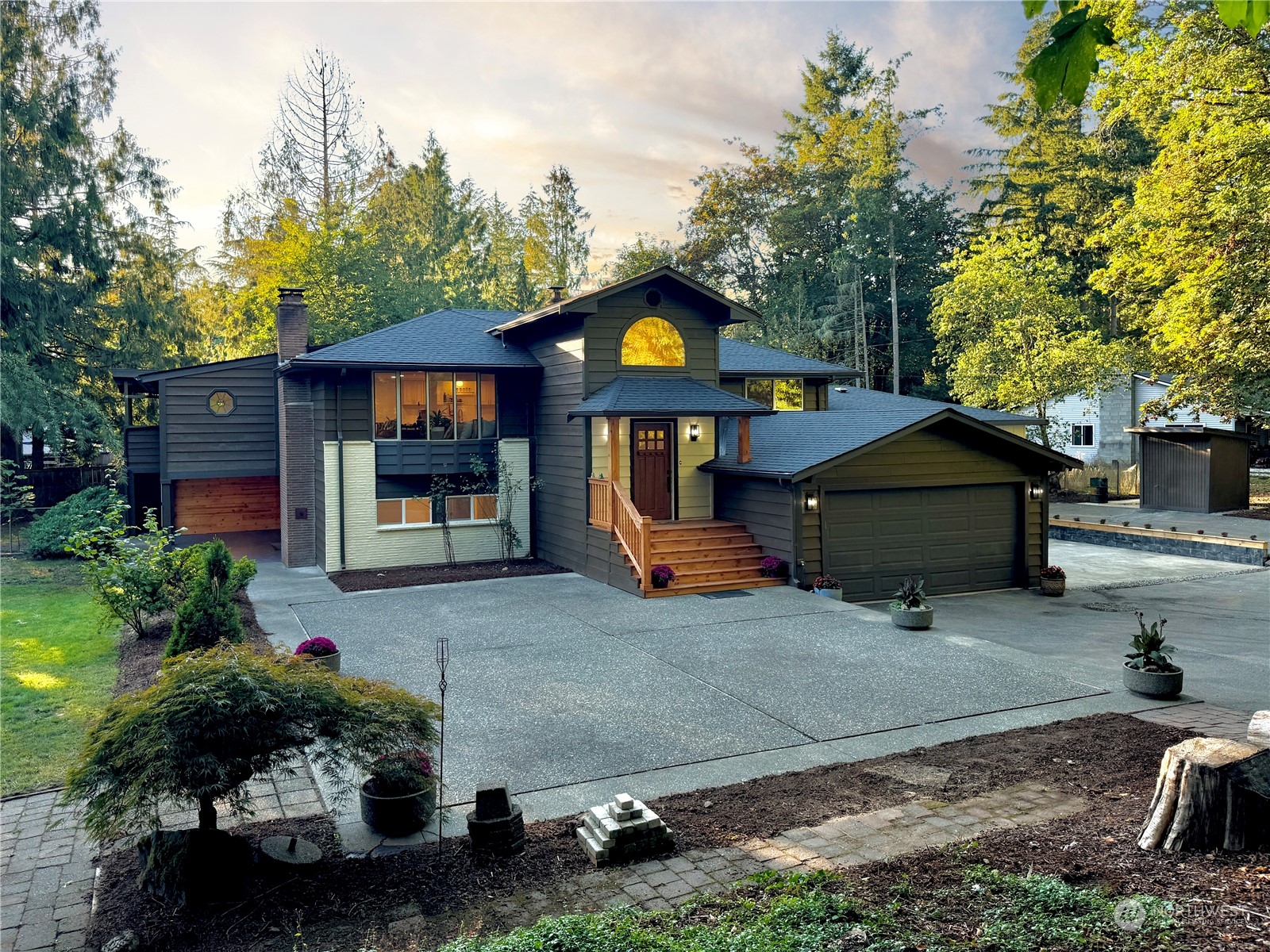 a front view of a house with garden