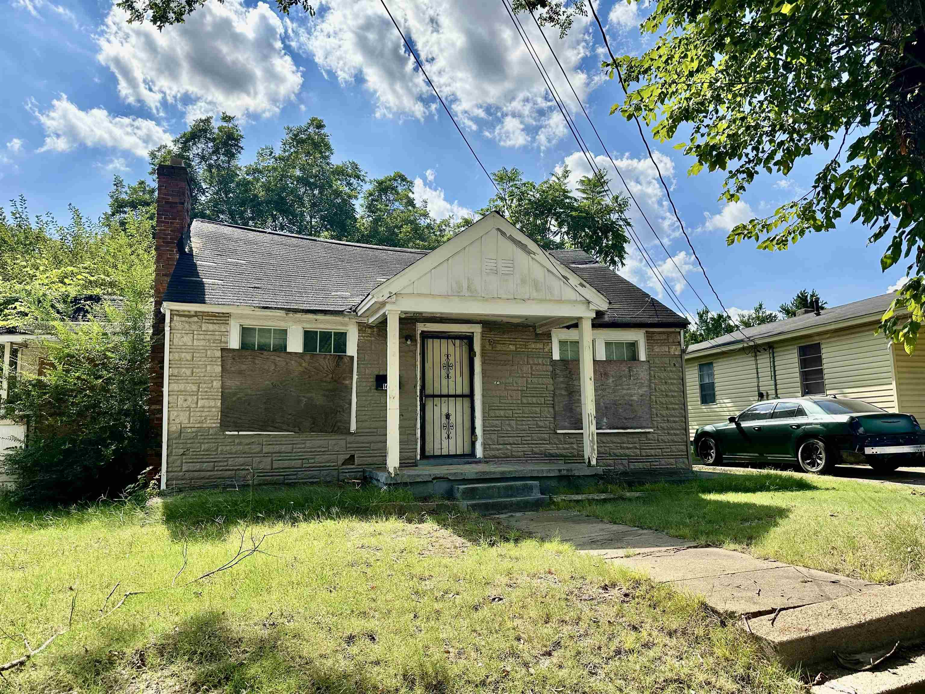 front view of a house with a yard