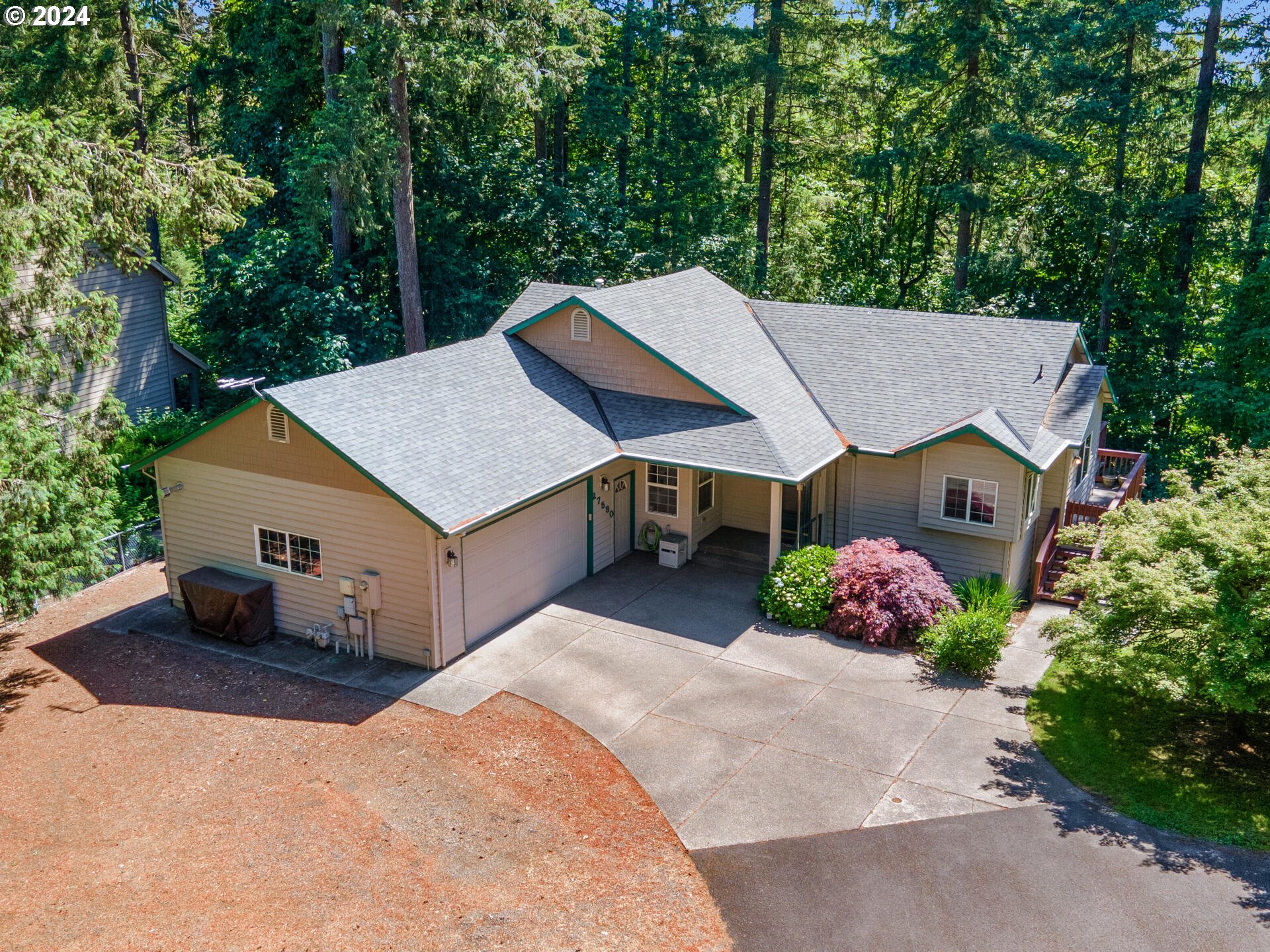 a house with trees in the background