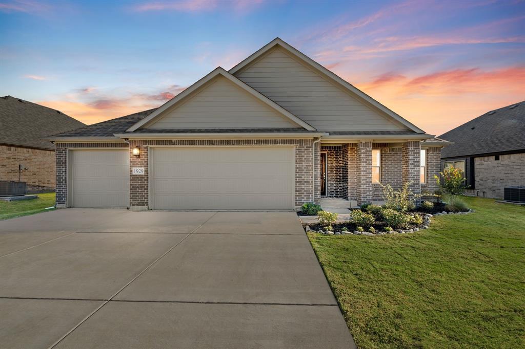 front view of house with a yard