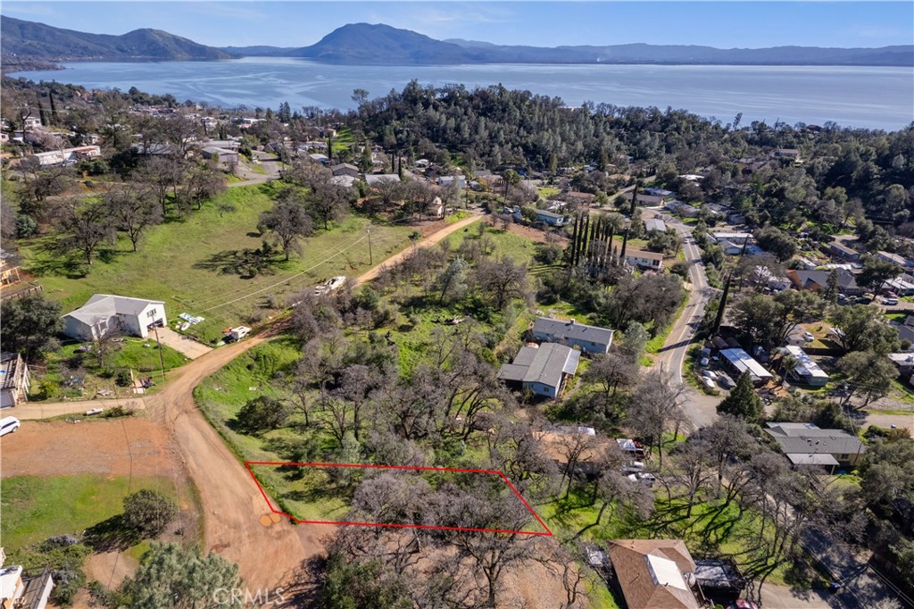 an aerial view of residential house with outdoor space