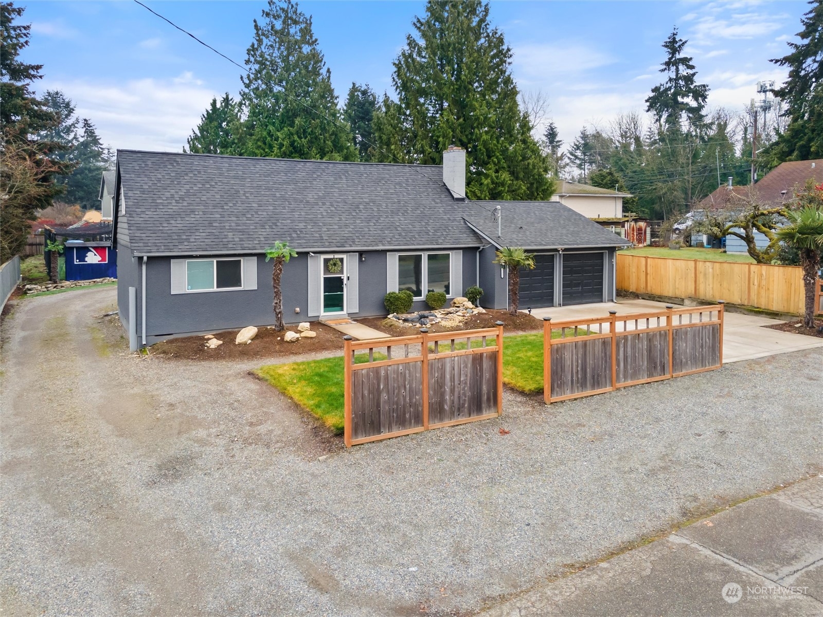 front view of a house with a yard