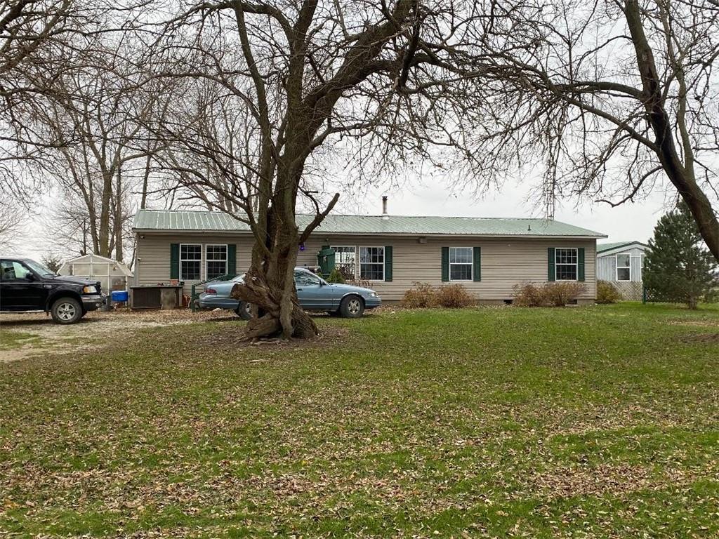 a view of a yard in front of a house