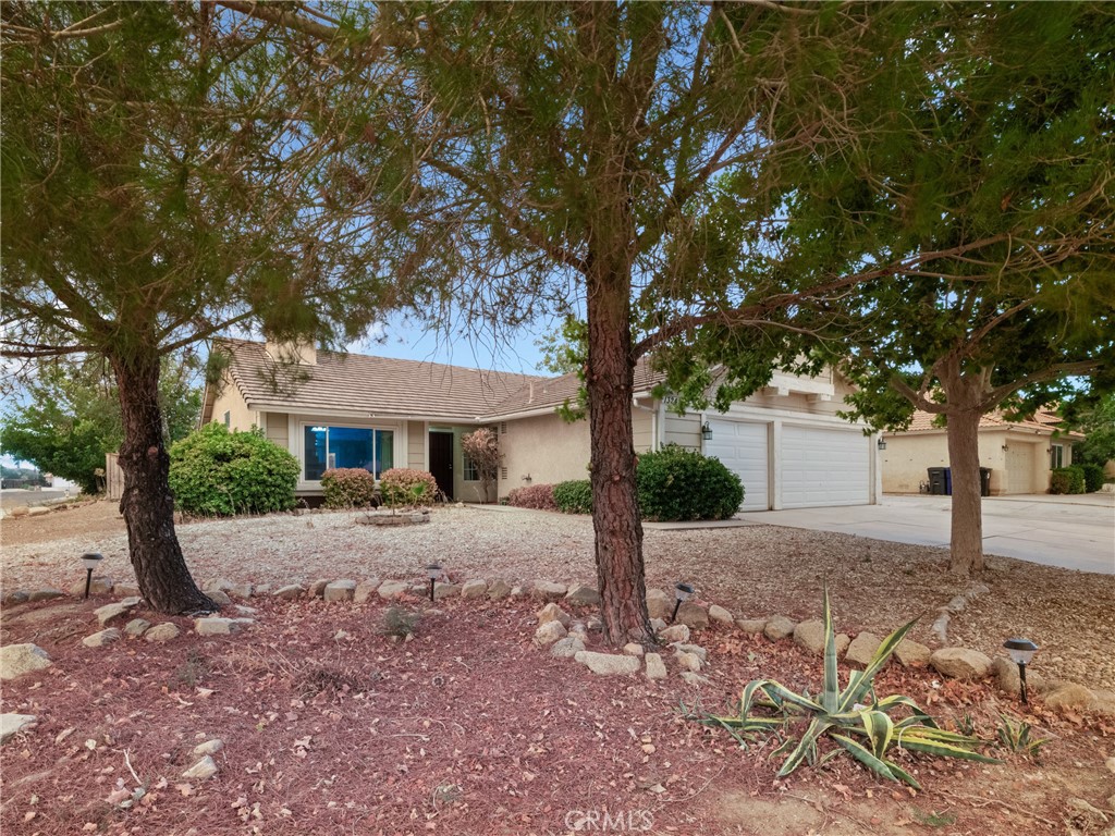 a house with trees in front of it