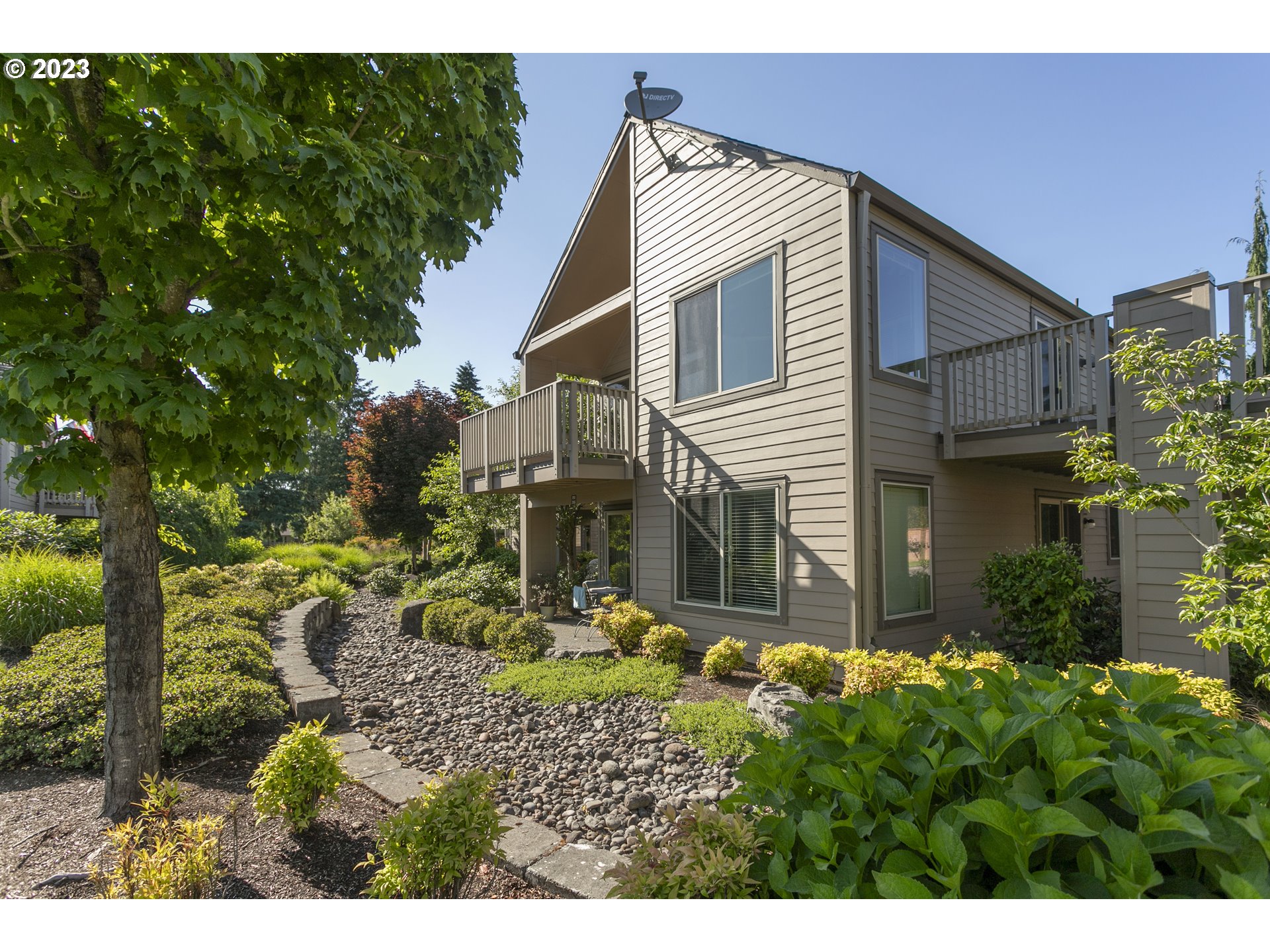 a house view with a backyard space