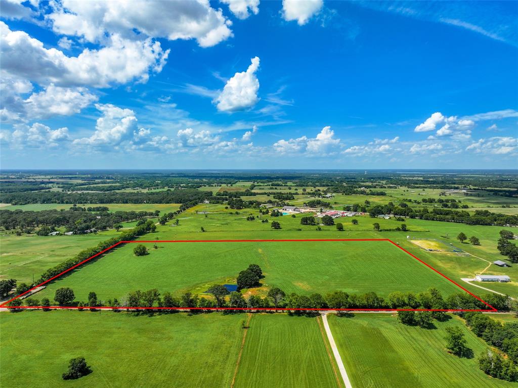 a view of a golf course with a lake