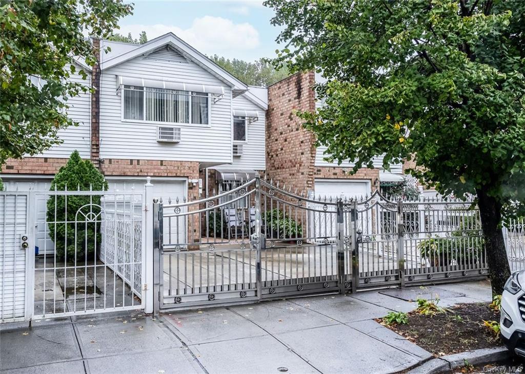 View of front of home featuring a garage