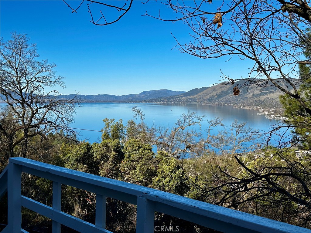 a view of a lake from a balcony