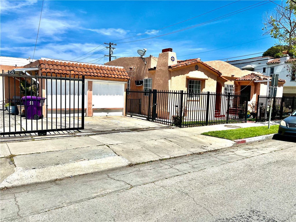 a view of a house with a street