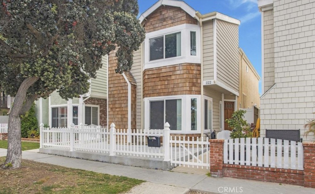 a front view of a house with a porch