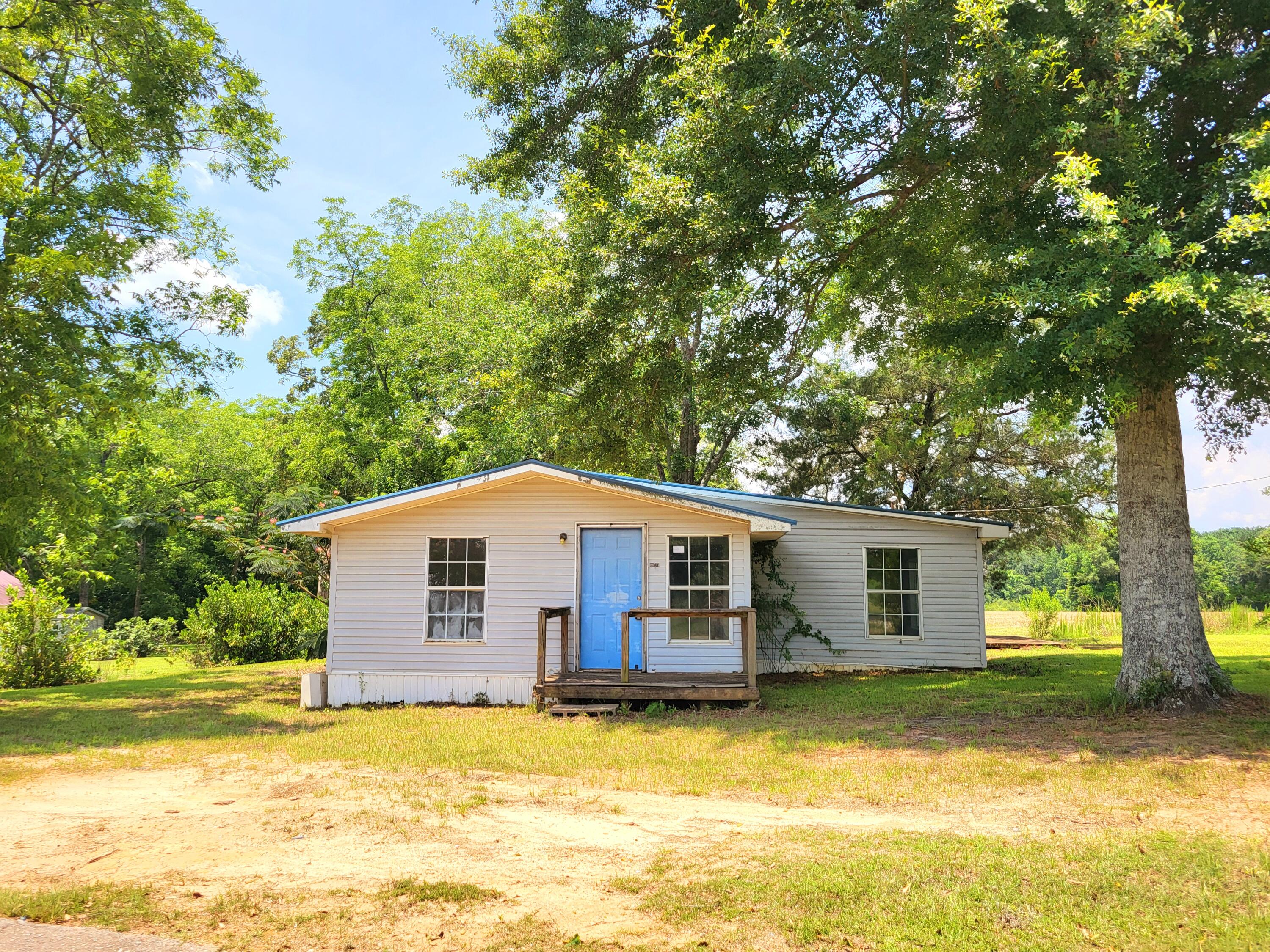 a view of a house with a swimming pool