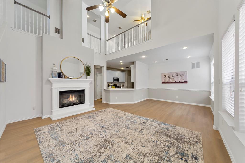 a view of empty room with a fireplace