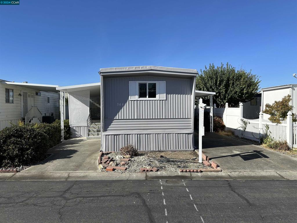 a front view of a house with garage