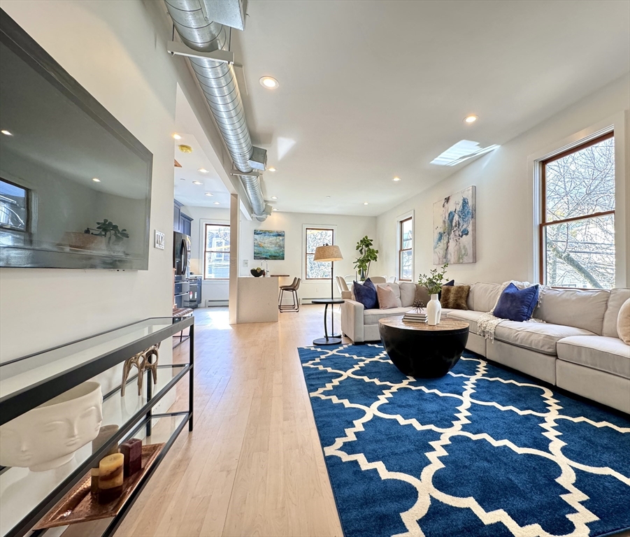 a living room with furniture and a couch