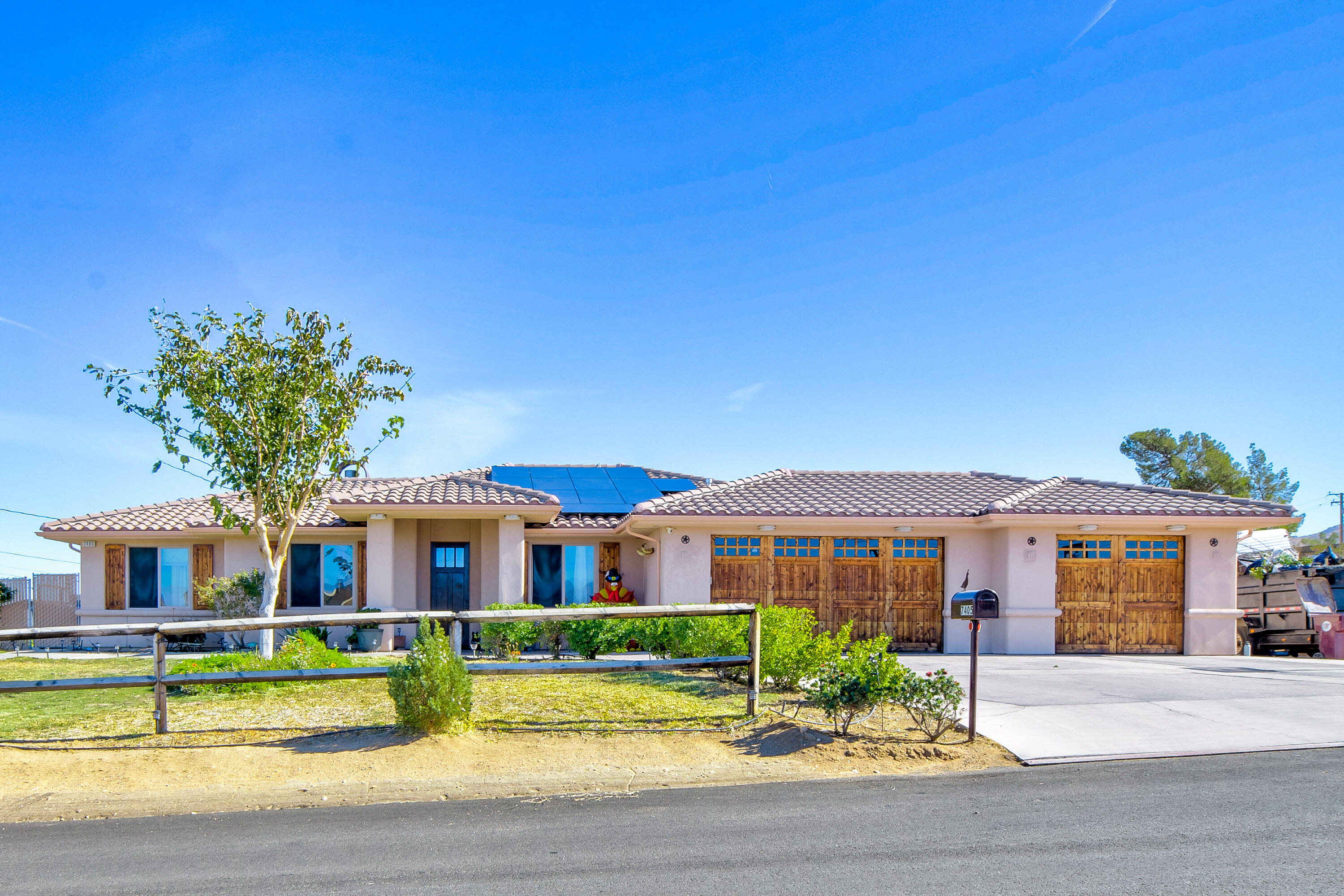 a front view of building with yard