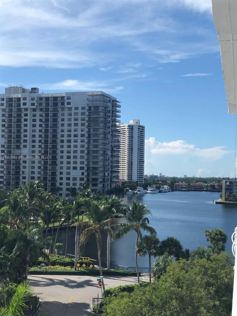 a view of a city with tall buildings