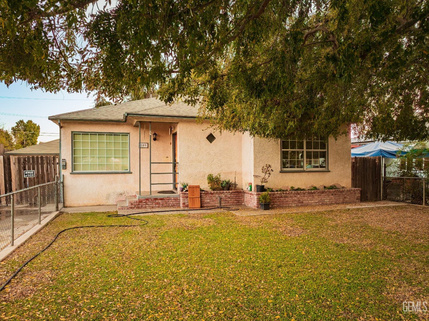 a front view of a house with a patio