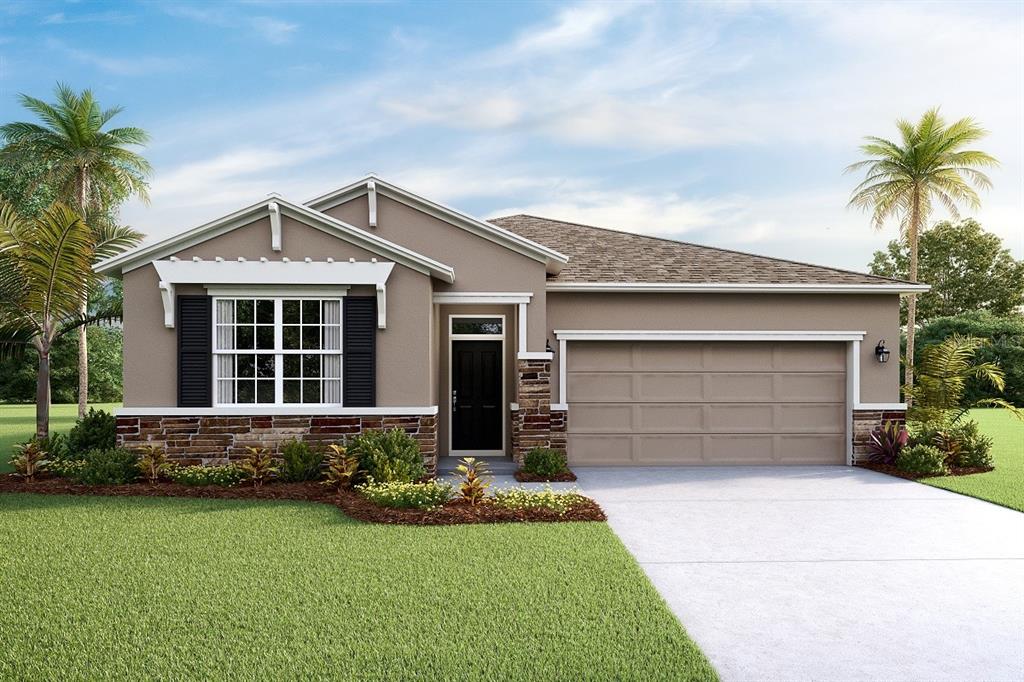 front view of a house with a yard